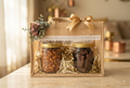 NutriTohffa Regular Diwali Hamper — two glass jars of almonds and protein bar pieces in a jute gift bag with lace trim and gold ribbon bow