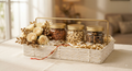 NutriTohffa Utsav Premium Tray — three glass jars of almonds, cashew W240 and protein bar in a white and gold wicker tray with floral accent